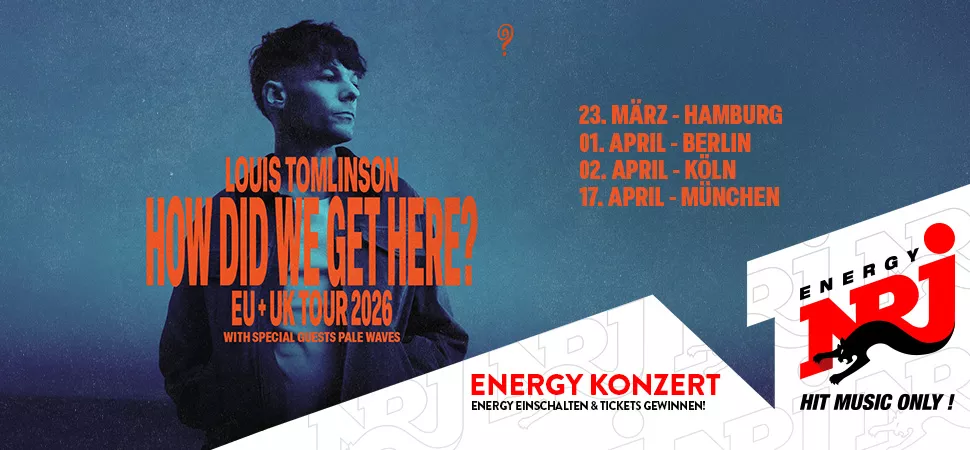 Konzertplakat mit einem Foto von Louis Tomlinson mit orangener Schrift