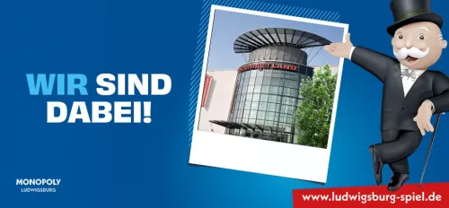 Der Monopolymann neben dem Breuningerland, der Schriftzug "Wir sind dabei!"