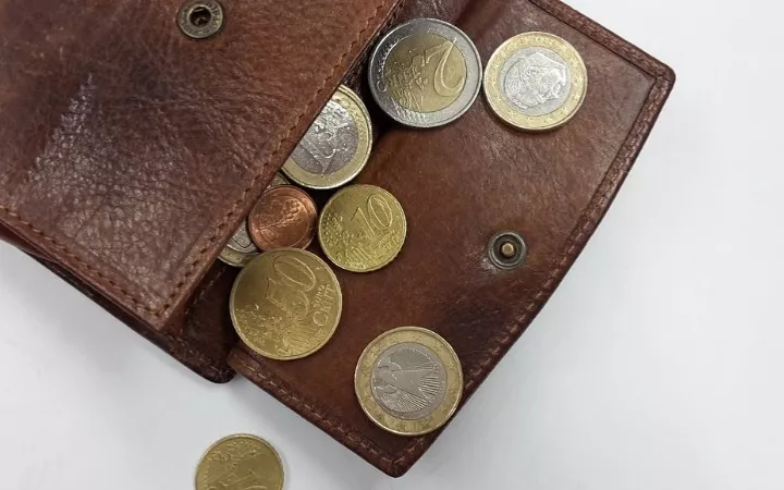 Header Geldbeutel 970 Geldbeutel mit Münzen
